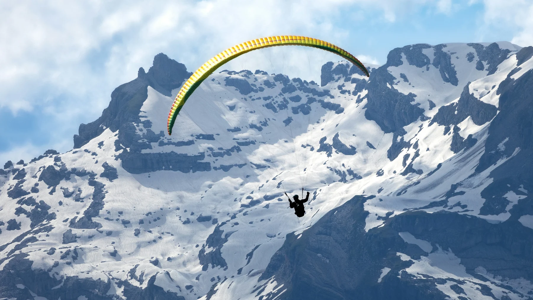 Paraglider above a ridge