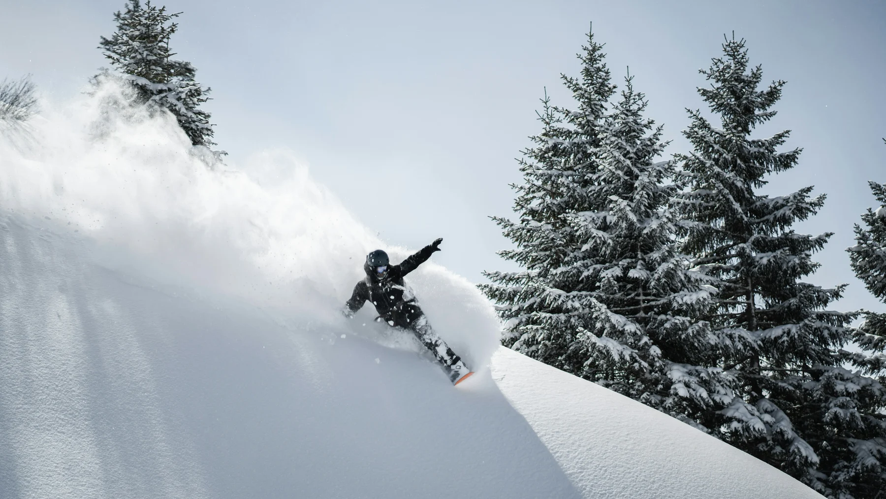 Snowboarder in deep powder